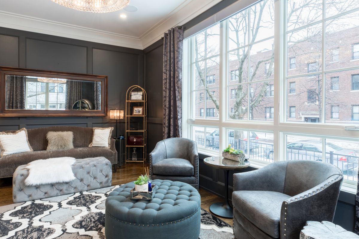 Photo by Alex Qian showing the interior layout of a street apartment living room. 