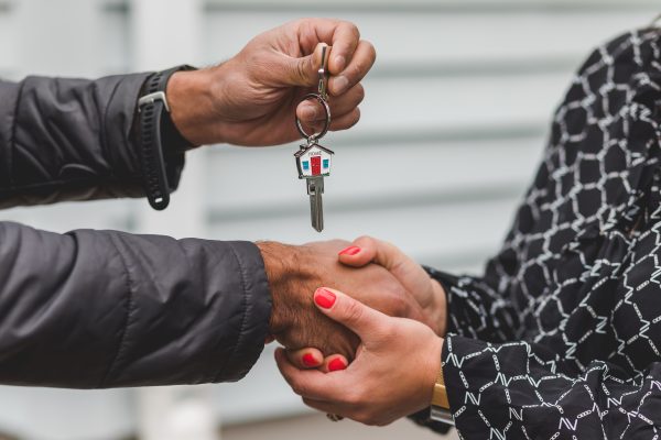 A man offering a key to a lady who has bought a new property via mortgage.
Photo Credit: RODNAE Productions